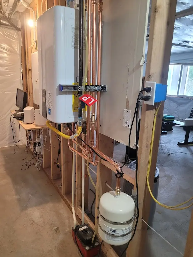 Licensed plumber repairing a kitchen sink in Columbia